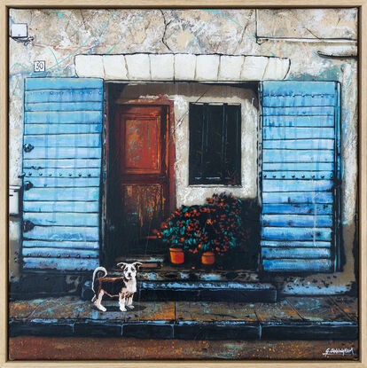 a lost dog stands in front of an old building with blue doors in France