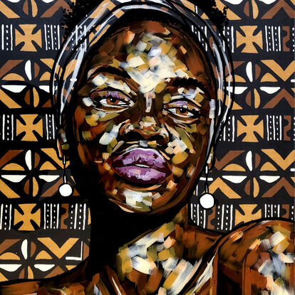 Portrait of an African woman with a traditional fabric background