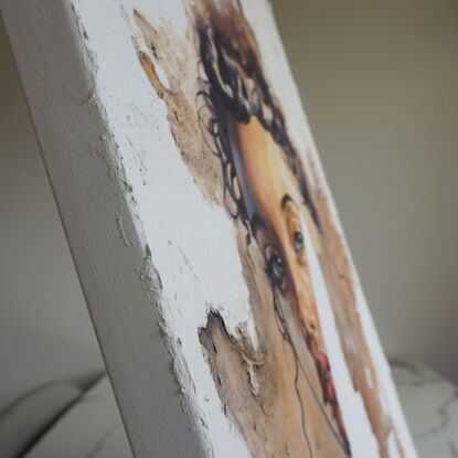 Girl peering through portal in stucco texture