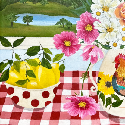 still life scene featuring a vase with a rooster filled with pink and white cosmos and orange roses next to a bowl with red spots filled with lemons, against a hinterland inspired landscape window view backdrop and a red gingham table cloth