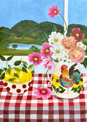 still life scene featuring a vase with a rooster filled with pink and white cosmos and orange roses next to a bowl with red spots filled with lemons, against a hinterland inspired landscape window view backdrop and a red gingham table cloth