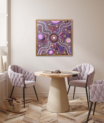 Aboriginal art that talks about connecting with the land. Purple, red and pink colours are used in this piece. 