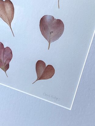 Heart shaped eucalyptus leaves in a grid pattern, painted in watercolours.