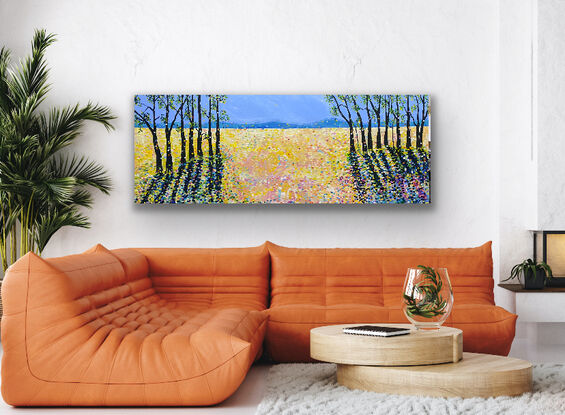 Bold striking brown black trees in two groups on the sides of the painting contrast with the sunny yellow fields   The striking  tree shadows create drama and interest against the medley of sunshine whilst  splashes of electric colour warm the scene. This is a striking piece to add vibrancy and interest to a room. There is an underlying feeling of positivity and happiness with the bright colour. 