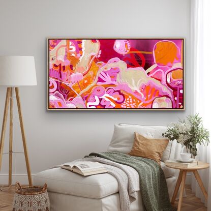 Bright colours in floral shapes depicting a landscape, reds, oranges and pinks 