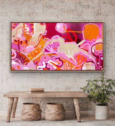 Bright colours in floral shapes depicting a landscape, reds, oranges and pinks 