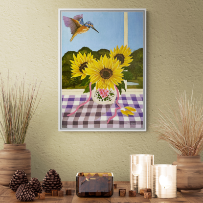 vase of 3 sunflowers on a purple gingham table cloth against a window view hinterland inspired landscape scene