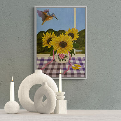 vase of 3 sunflowers on a purple gingham table cloth against a window view hinterland inspired landscape scene