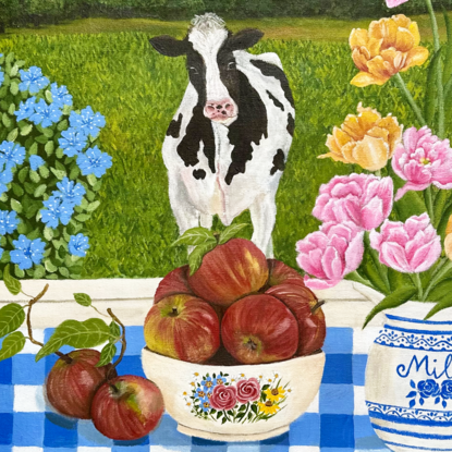 still life scene featuring a white and blue milk jug with filled with yellow and pink foxtrot tulips next to a bowl filled with red apples, against a hinterland inspired landscape window view backdrop and a blue gingham table cloth