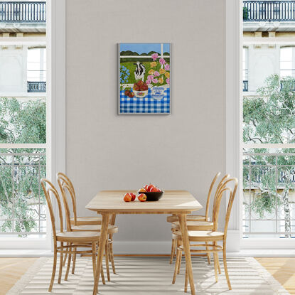 still life scene featuring a white and blue milk jug with filled with yellow and pink foxtrot tulips next to a bowl filled with red apples, against a hinterland inspired landscape window view backdrop and a blue gingham table cloth