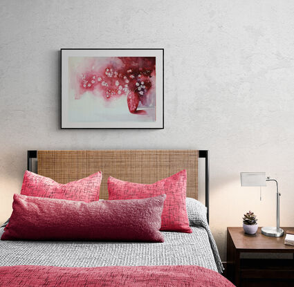 red, pink and white flowers in a red vase with long shadows