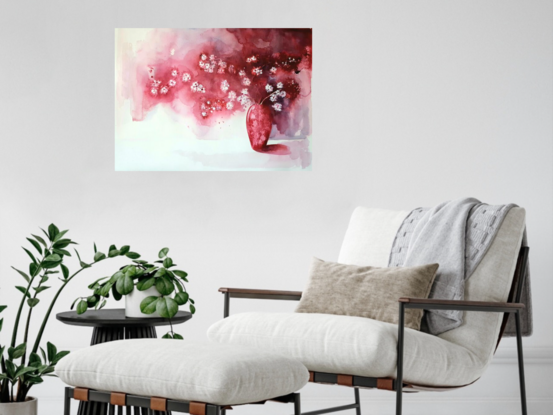 red, pink and white flowers in a red vase with long shadows