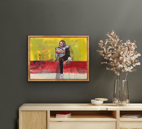 Young girl sitting on wall