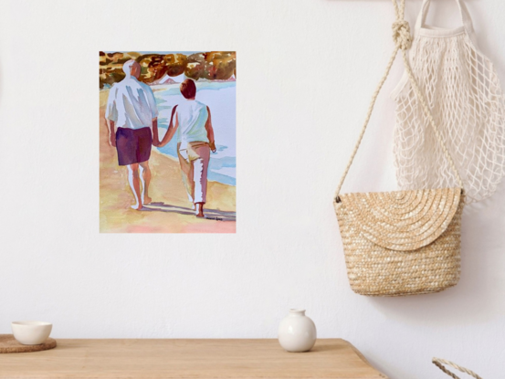 An artwork showing a couple walking leisurely on the beach. 