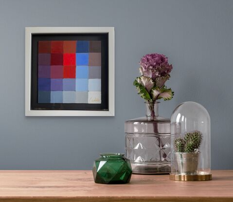 Gradations of red and blue square make this colour pop painting zing. 