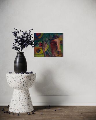 Colourful abstract face and figure on fabric wallhanging. Ready to hang.