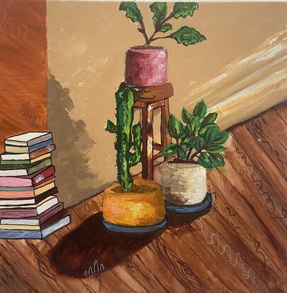 A stool, a stack of books, pot plants in a living room
As the afternoon light filters in 