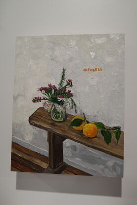 Impressionistic painting of an interior showing a white wall, wooden floorboards, a wooden church style bench which has a jar of flowers and oranges sitting on it. On the wall is #fca816 in orange text.