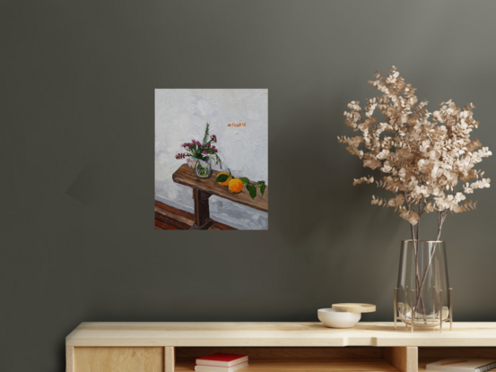 Impressionistic painting of an interior showing a white wall, wooden floorboards, a wooden church style bench which has a jar of flowers and oranges sitting on it. On the wall is #fca816 in orange text.