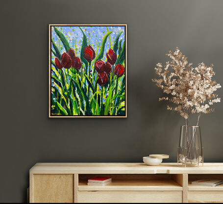 Brilliant dark red tulips sparkling with light in a field of dancing leaves. This is a slightly stylised and modern interpretation of a field of flowers that is unique and eye-catching. There is a transparency to some of the beautiful petals which intensifies the impression of light. The artwork has a playful feeling with its styled leaves and happy sparkles of colour. 