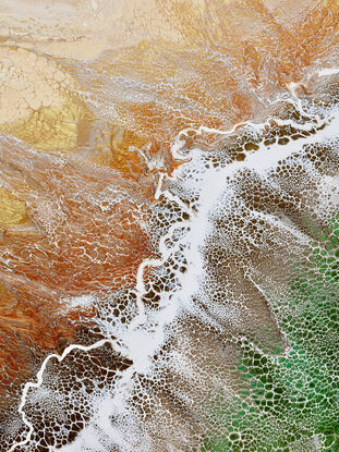 ABSTRACT painting that gives the impression of soothing ocean waves lapping in to soft sandy beach with slow easy waves creating crests of white..  The intricate mosaic pattern within the tonal jade green hues  plus the glimmering metallics adds added interest and intrigue like soft waves gathering in at shore.
The closer you get to the painting the more of the interesting details and patterns you can see. Metallics add an extra depth because the painting changes personality when one views from different angles.
although it is an impressionistic abstract, it still has a sense of motion of waves moving and frothing white shoreline