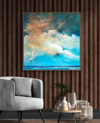 Dramatic  highly textured blue and ochre cloudscape over peaceful blue sea.

