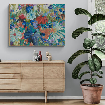 Modern colourful abstract canvas print of an modern blue tropical flowers  in a style of expressionist landscape with warm red and blue tropical flowers in bloom