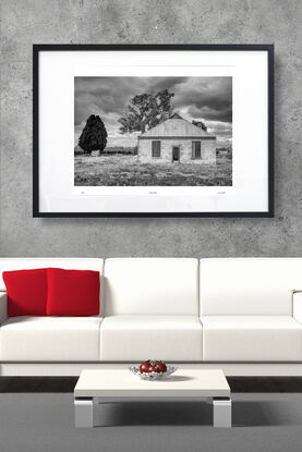 abandoned pioneers hut in rural farm setting