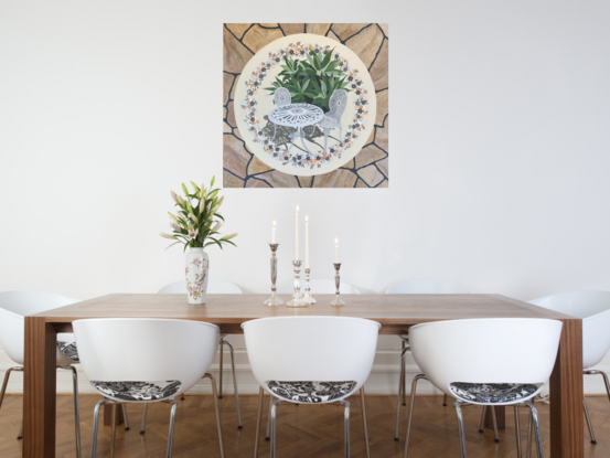 garden furniture and cactus set on a floral plate with a sandstone paving background