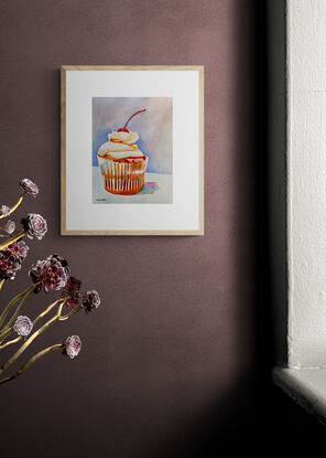 An artwork showing a cupcake with a cherry on the top.