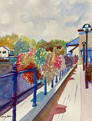 An artwork showing a display of flower baskets adorning the railings between a canal and a public house.