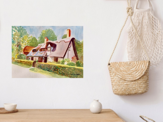 An artwork showing a quiet shady thatched cottage drenched in sunshine.