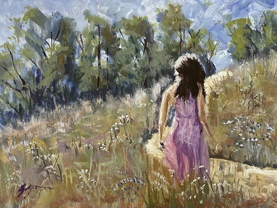 Girl in wild flower meadow 
