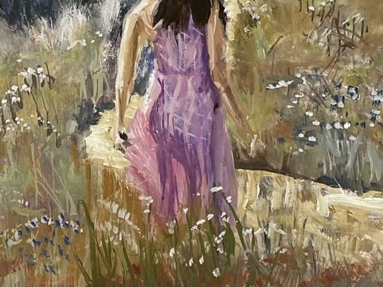 Girl in wild flower meadow 
