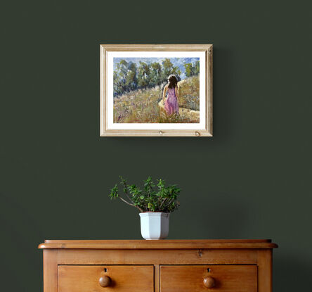 Girl in wild flower meadow 
