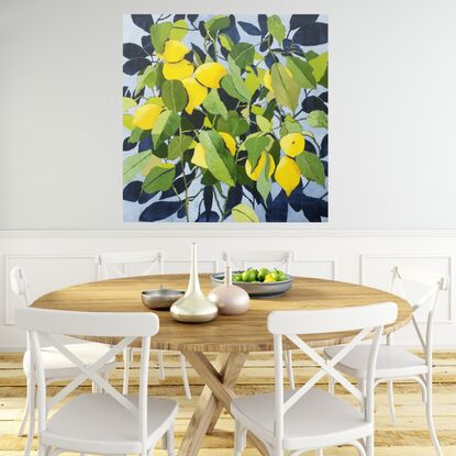 A lush , vibrant green lemon tree, full of happy plumb, fresh lemons