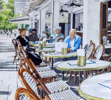 This busy,  cafe corner in Hastings Street with typical French cafe chairs lined on  the footpath and shadowed by large green poincianas has attracted tourists and locals for their morning coffee for many years.  A few locals are seated before the rush enjoying their first coffee of the day.  Internal lighting with chandeliers  define the internal dark walls and drink cabinets behind  and provide a sophisticated tonal  ambience. 