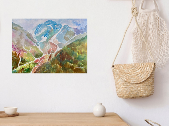 artwork showing forest and the distant mountain range
