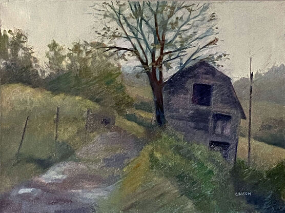 Barn on hill in rain