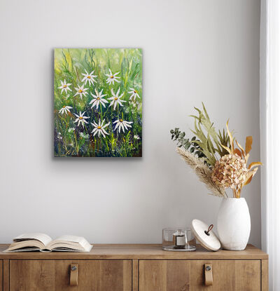 A snapshot of little white flowers dancing in the breeze. There are splashes of yellow, warm ochre and vivid greens in stark contrast to the beauty of the white flowers. 