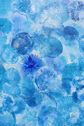 a beautiful layered acrylic painting in blue on blue on blue on blue.  Has the feeling of blue jelly fish in the ocean.incredible depth and sense of peace