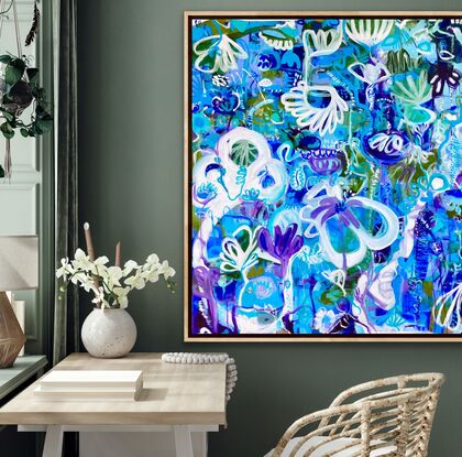 Large and small swirling shapes depicting flowers and trees in shades of blues and purples with white 