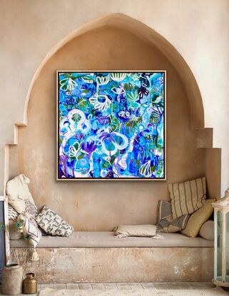 Large and small swirling shapes depicting flowers and trees in shades of blues and purples with white 