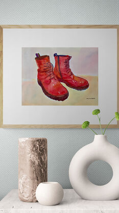 artwork showing a pair of well loved red leather boots
