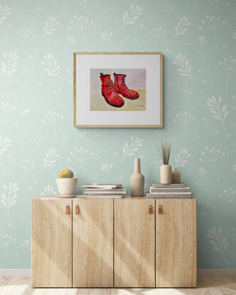 artwork showing a pair of well loved red leather boots
