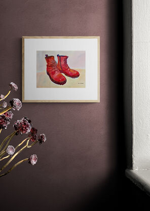 artwork showing a pair of well loved red leather boots
