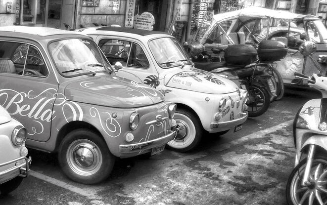 Row of motor scooters in Rome, Italy