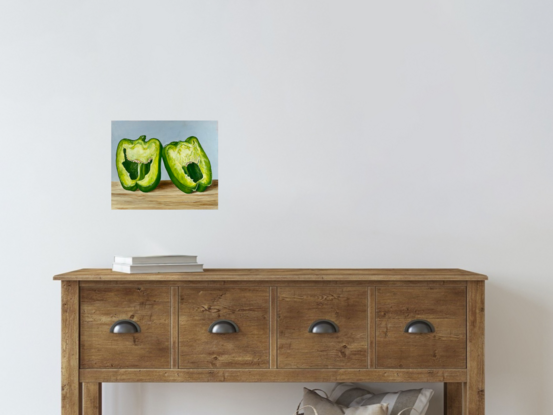 Capsicum halves on wooden surface 