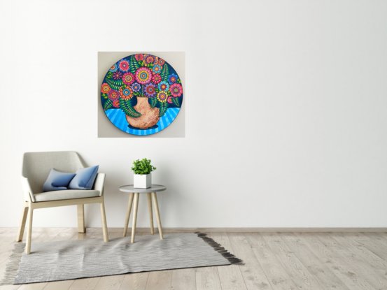 Aged pottery urn of vibrantly coloured flowers on a light blue striped table cloth in front of dark blue background.