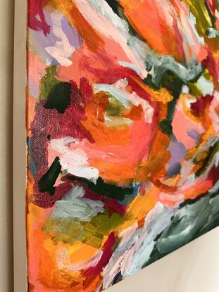 Abstract of multiple brush strokes with pink, orange and green tones. 